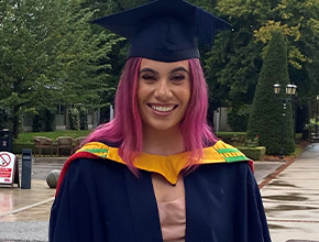 aimee fletcher at her graduation in cap and gown